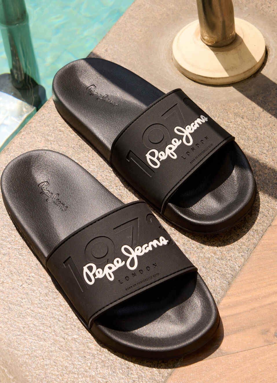 Black Lightweight Beach Slides With Embossed Logo Print, , large image number 0